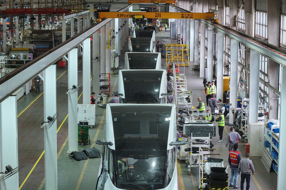 Electric trucks currently represent less than 1 per cent of truck sales worldwide, according to the International Energy Agency (IEA) — with China making up 70 per cent of those sales in 2023. — AFP pic