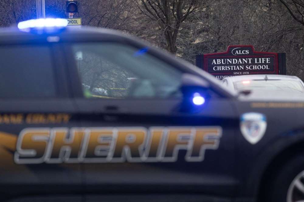 A teenage student opened fire Monday at a school in the northern US state of Wisconsin, killing two and injuring several others before being found dead, officials said. — AFP pic