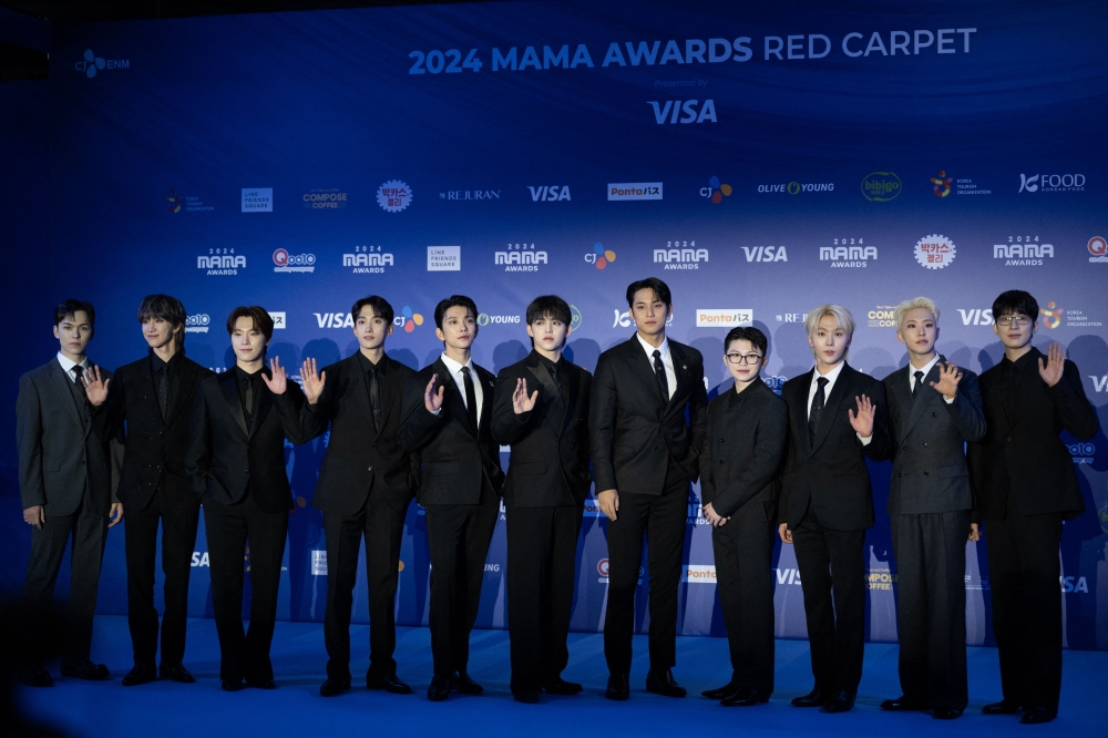 Seventeen arrive on the red carpet to attend the 2024 MAMA Awards in Osaka November 23, 2024. — AFP pic