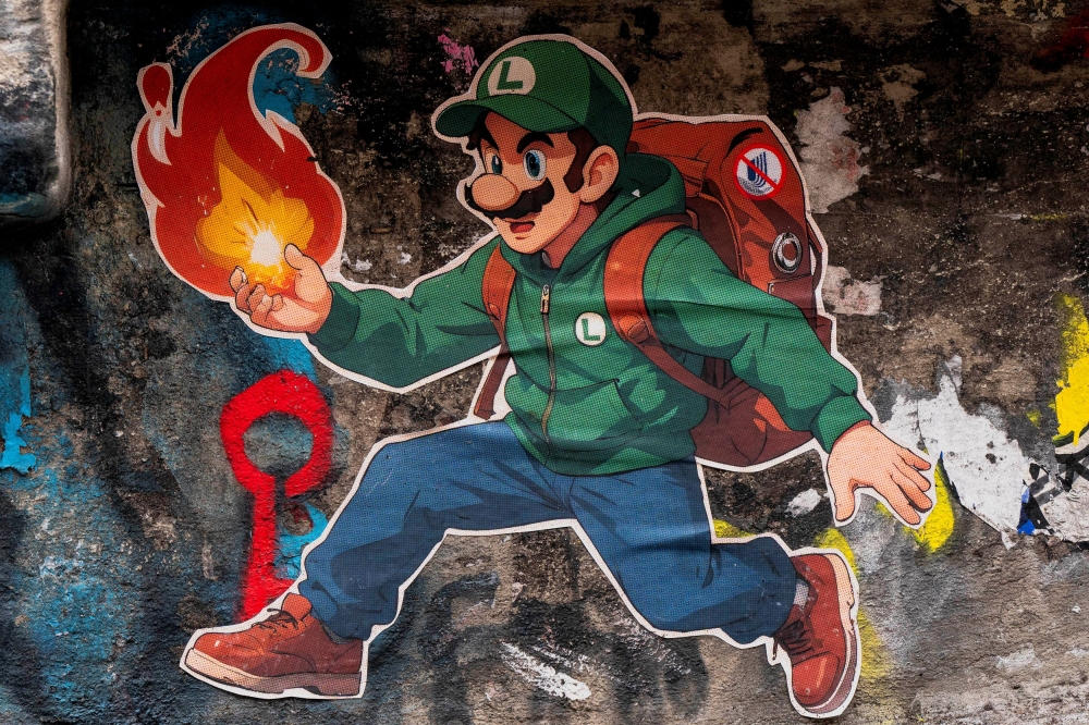 Street art depicting video game character Luigi, and a crossed-out UnitedHealthcare logo, referencing Luigi Mangione, a suspect in the killing of UnitedHealth CEO Brian Thompson, appears on a wall at Pike Place Market in Seattle, Washington, on December 11, 2024. — Reuters pic