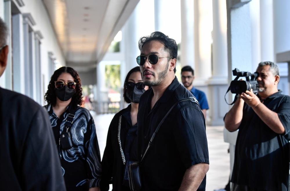 The three accused — Hasli Ikhwan Arif Zul Hasli, Norshazrina Md Zamri and Norhidayah Mahadi — faced the charges in connection with an online prostitution advertisement. — Bernama pic