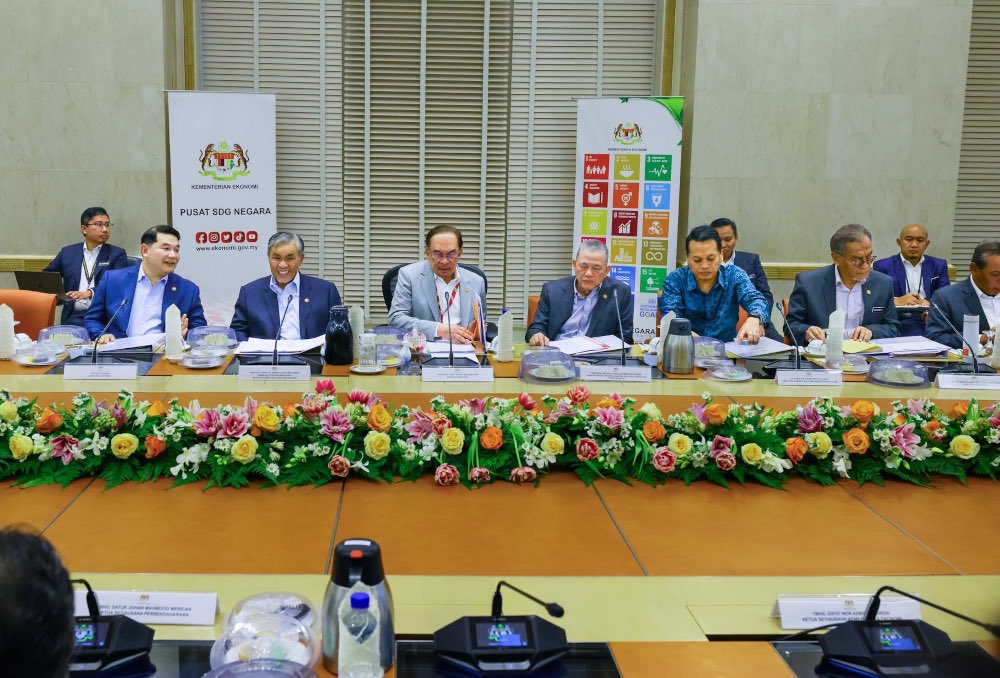 Prime Minister Datuk Seri Anwar Ibrahim chairs the National SDG Council Meeting 2024, December 18, 2024. — Picture from X/Anwar Ibrahim 