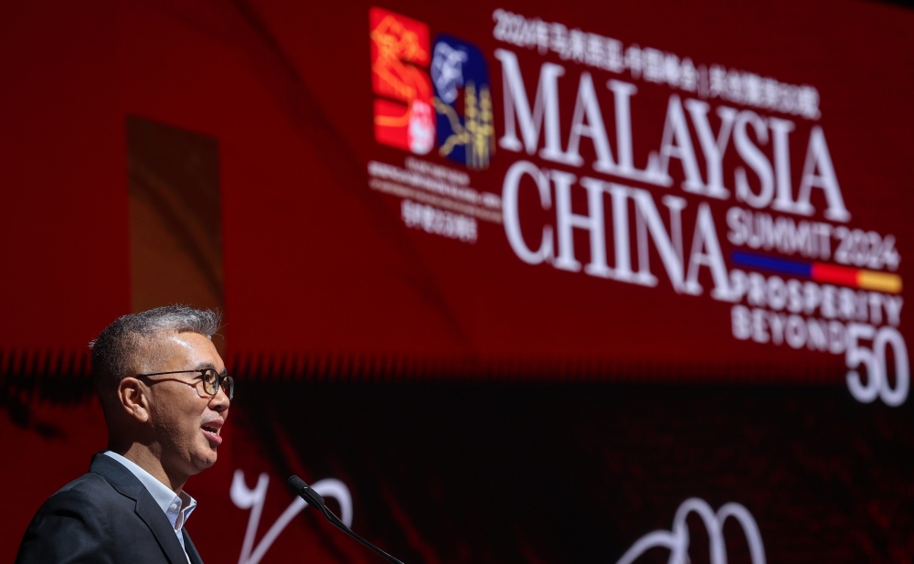 Minister of Investment, Trade and Industry Tengku Datuk Seri Zafrul Abdul Aziz delivers his speech at the Malaysia-China Summit 2024 reception dinner in Kuala Lumpur December 18, 2024. — Bernama pic