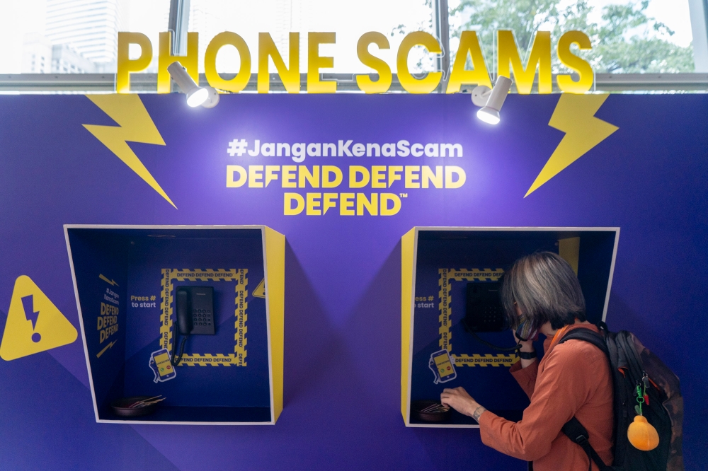In a written response to the Dewan Negara dated December 18, the MoF said the NSRC received 64,000 calls, including case reports from scam victims and advisory services to the general public. — Picture by Shafwan Zaidon