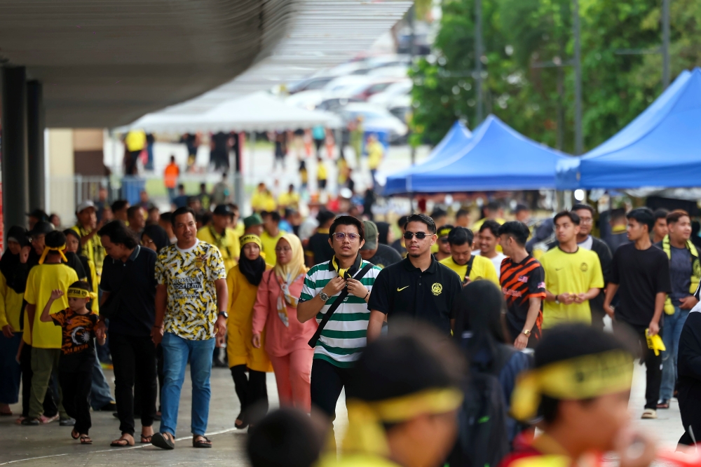 Harimau Malaya fans came out in droves at the Bukit Jalil National Stadium to watch the decider between Malaysia and Singapore in the 2024 Asean Cup Group A match tonight. — Bernama pic 