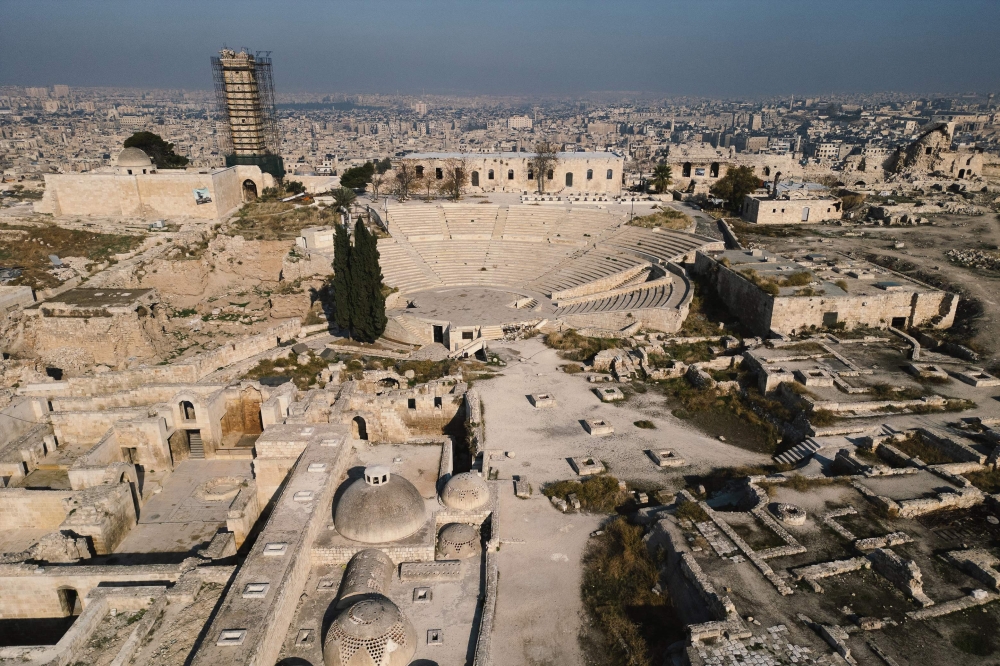 This aerial view shows the Citadel overlooking the city of Aleppo on December 17, 2024. — AFP pic