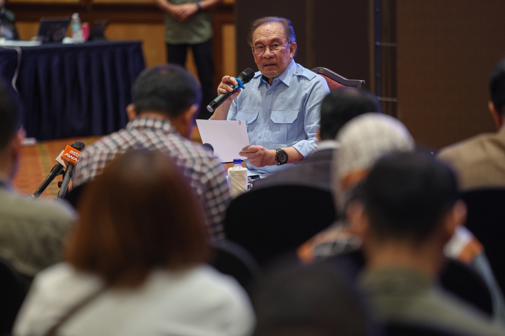 Prime Minister Datuk Seri Anwar Ibrahim speaks during a press conference in Subang December 21, 2024. — Bernama pic
