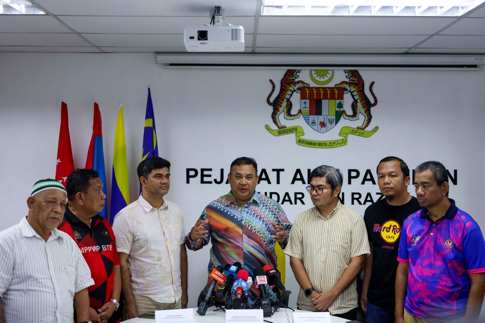 The prime minister's political secretary Datuk Azman Abidin (centre) attends press conference  at the Bandar Tun Razak Member of Parliament's office in Kuala Lumpur, Dec 21, 2024. — Benama pic