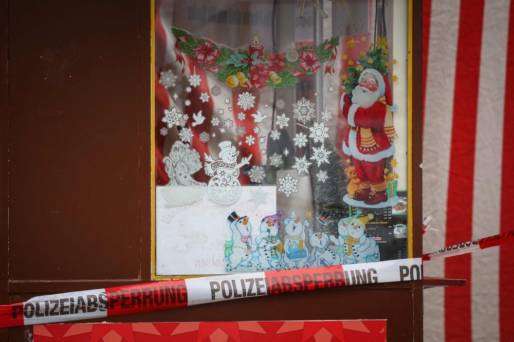 Emotions have run high, and Magdeburg has been in deep mourning over the mass carnage Friday evening that left a nine-year-old child among the dead. — AFP pic