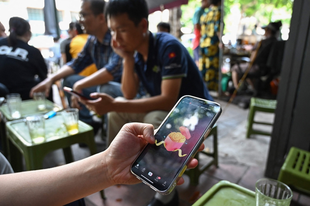 Social media users in Vietnam will need to verify their identities as part of strict new internet regulations that compels tech giants operational in Vietnam to store user data, provide it to authorities on request, and remove content the government regards as illegal within 24 hours. — AFP