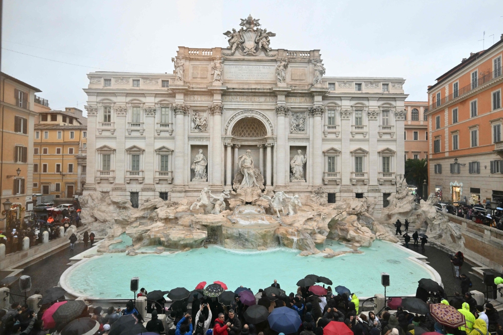 A general view shows the Trevi fountain after renovation works in Rome, on the day of its reopening, on December 22, 2024. — AFP pic