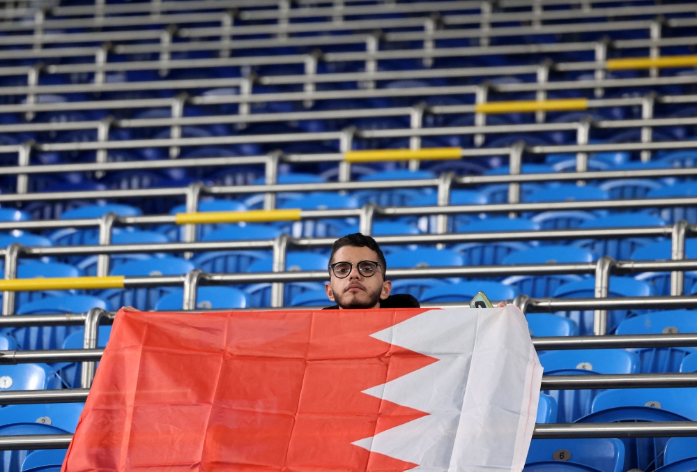 File photo of a football fan holding the Bahrain flag at the Jaber Al-Ahmad International Stadium, Kuwait City. Marking the 50th anniversary of diplomatic relations, Malaysia and Bahrain reaffirm their commitment to strengthening bilateral cooperation across diverse sectors, aiming to foster a more prosperous and resilient future. — Reuters pic  