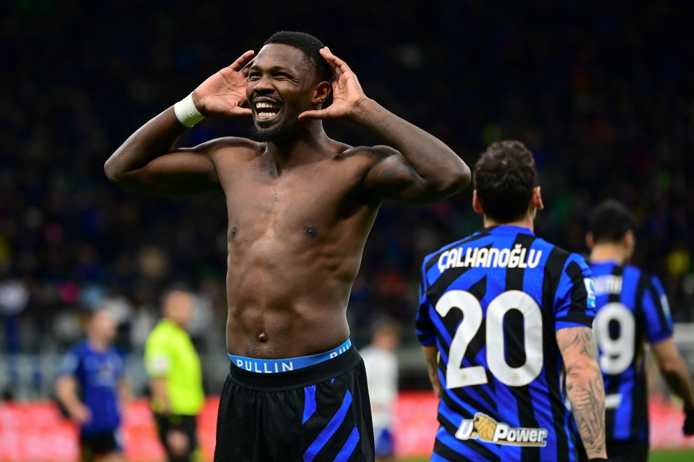 Inter Milan's Marcus Thuram celebrates after scoring Inter Milan's second goal against Como. — AFP