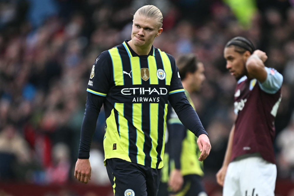 Manchester City's Norwegian striker #09 Erling Haaland reacts during the English Premier League football match between Aston Villa and Manchester City at Villa Park in Birmingham December 21, 2024. — AFP pic