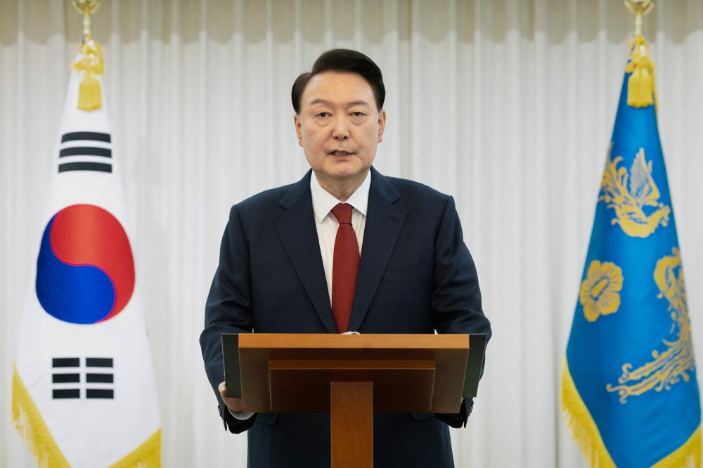 South Korea’s suspended President Yoon Suk Yeol refused a summons to appear for questioning on Christmas Day, the second time he has defied investigators’ demands in a week. — South Korean Presidential Office handout pic via AFP
