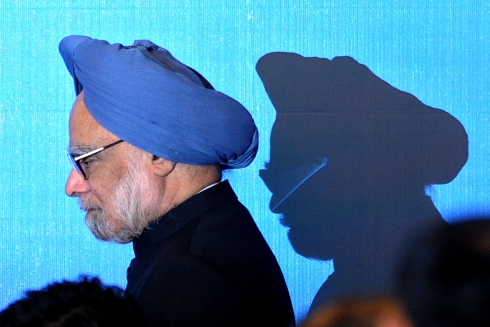 Manmohan Singh walks on stage for a photo opportunity as part of the 5th East Asia Summit in Hanoi October 30, 2010. India’s former prime minister died on December 26, aged 92, after he was admitted to hospital for an illness, the country’s leader Narendra Modi said. — AFP pic