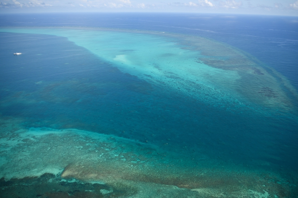 An aerial view of the Chinese-controlled Scarborough Shoal during a maritime surveillance flight by the Philippine Bureau of Fisheries and Aquatic Resources (BFAR) over disputed waters of the South China Sea. China’s coast guard conducted patrols around the Scarborough Shoal in the South China Sea today to safeguard China’s territorial rights. — AFP pic