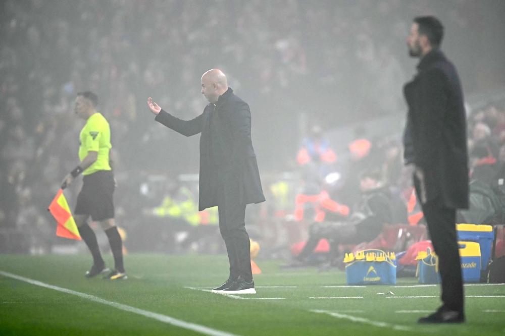 Liverpool's Dutch manager Arne Slot gestures to players from the touchline during the English Premier League football match between Liverpool and Leicester City at Anfield in Liverpool December 26, 2024. — AFP pic