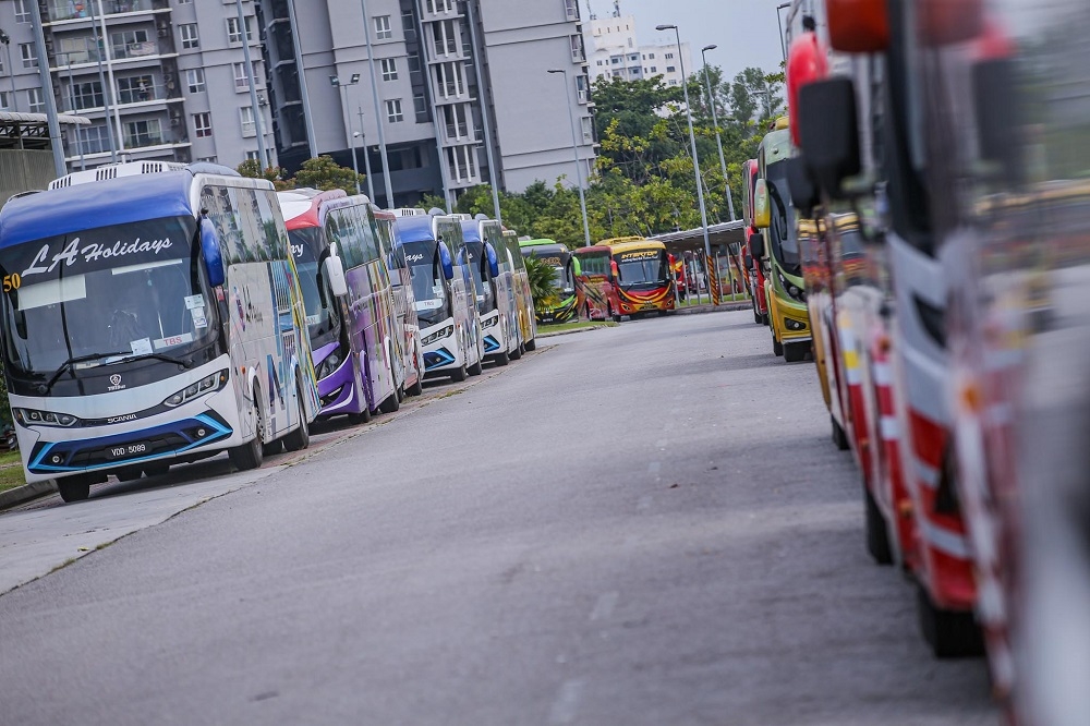 Express buses are seen at the Terminal Bandar Tasik Selatan (TBS) in Kuala Lumpur. Malaysia is facing a severe labour supply to meet the two-driver policy for long-haul buses. — File picture by Hari Anggara