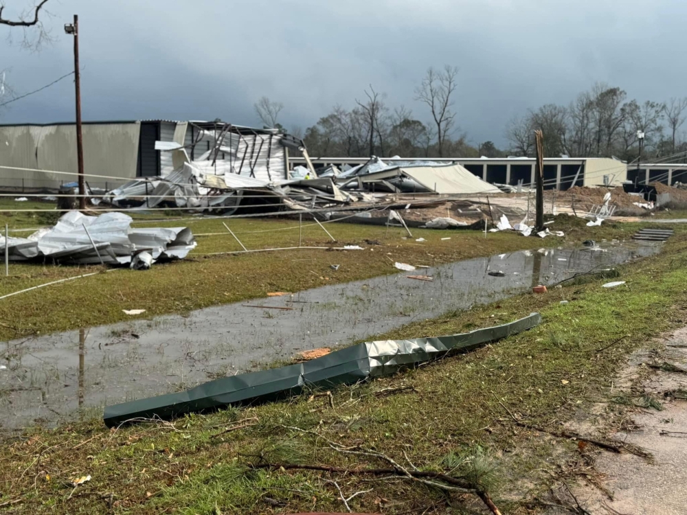 Debris from a damaged structure lies on the ground in an area afected by the weather, in Montgomery County, Texas in this handout picture. — Reuters