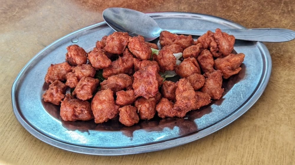 The Red Beancurd Fried Pork is a good snacking option — Picture by Ethan Lau