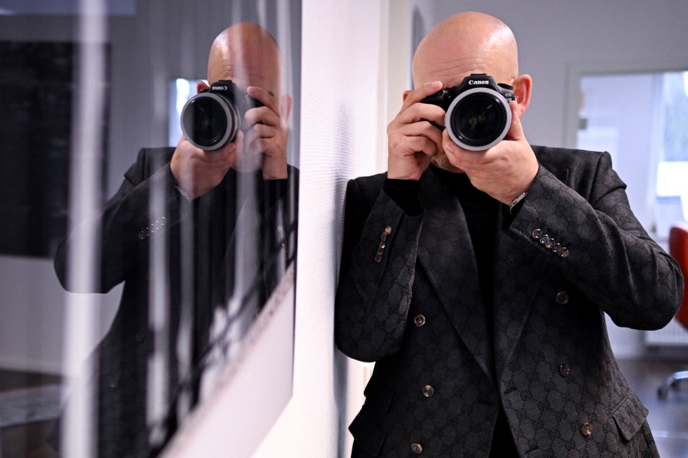 In Germany’s faltering economy, the sharp rise in sick leave among workers has become a major concern for business leaders. For Marcus Lentz, a private detective, this is a godsend. — AFP pic