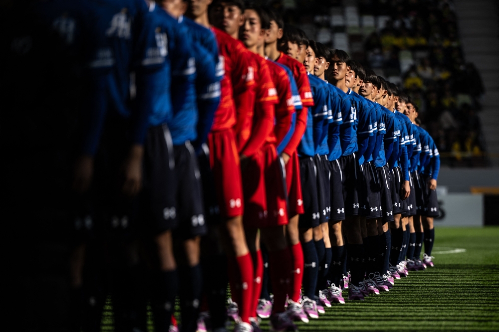 High school football teams from Japan’s 47 prefectures enter the opening ceremony for the 103rd All Japan high school football tournament at the National Stadium of Tokyo December 28, 2024. — AFP pic