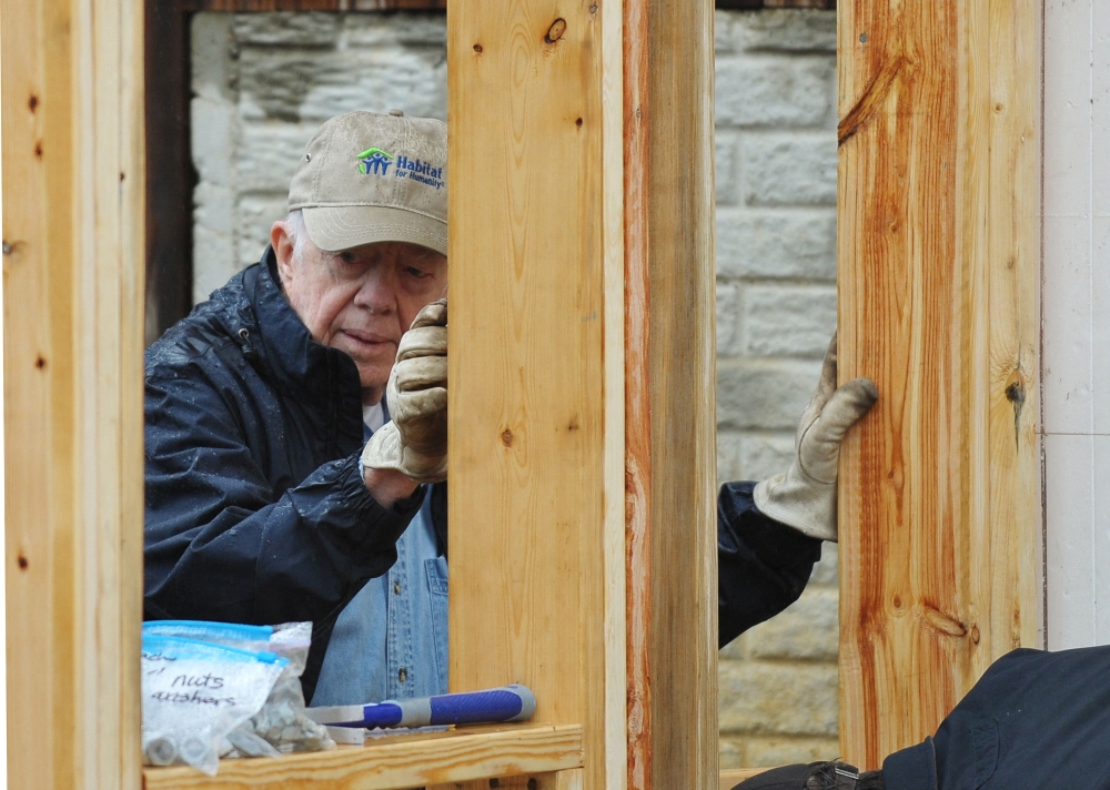 Former US president Jimmy Carter helping at a Habitat for Humanity project in 2010 in Washington, DC. — AFP