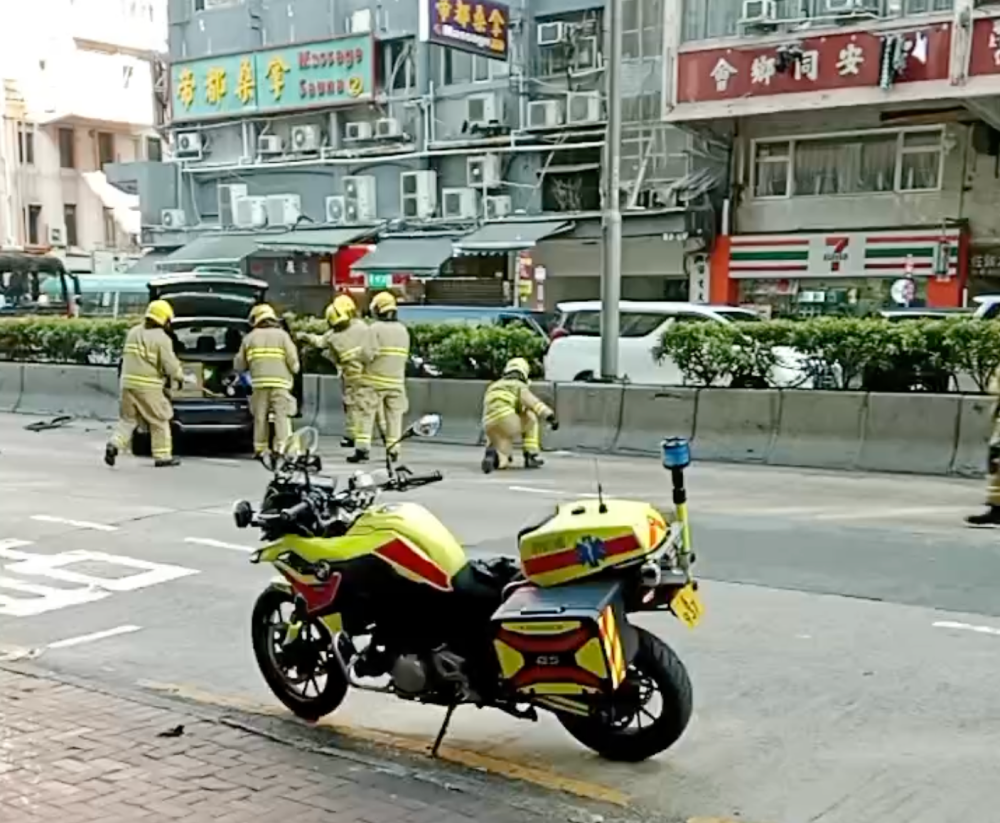 Emergency personnel attend the scene of the accident in Jordan Road, Kowloon. — Screengrab from Facebook video