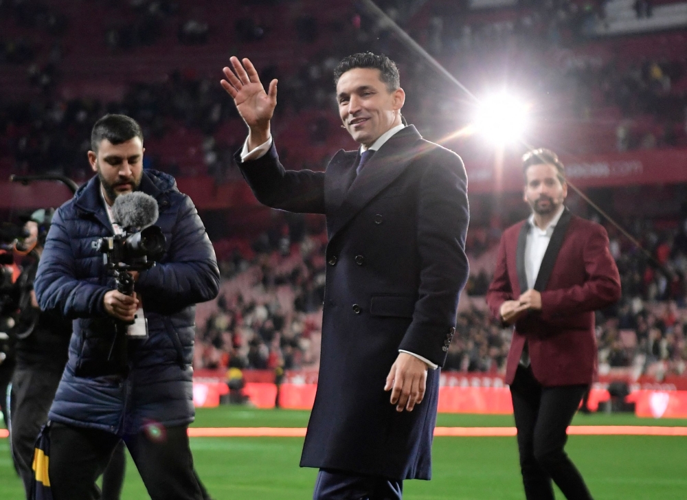 Sevilla’s Spanish defender Jesus Navas waves during his farewell ceremony, at the Ramon Sanchez Pizjuan stadium. — AFP