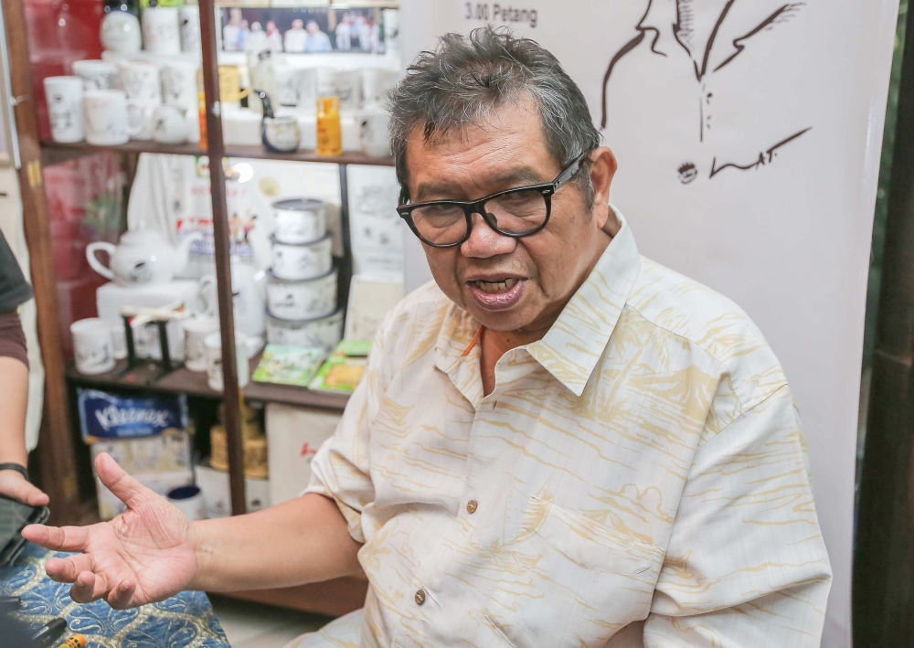 Malaysian cartoonist Lat or his real name, Datuk Mohammad Nor Khalid, has been drawing iconic illustrations and comics for 40 years now. — Picture by Farhan Najib