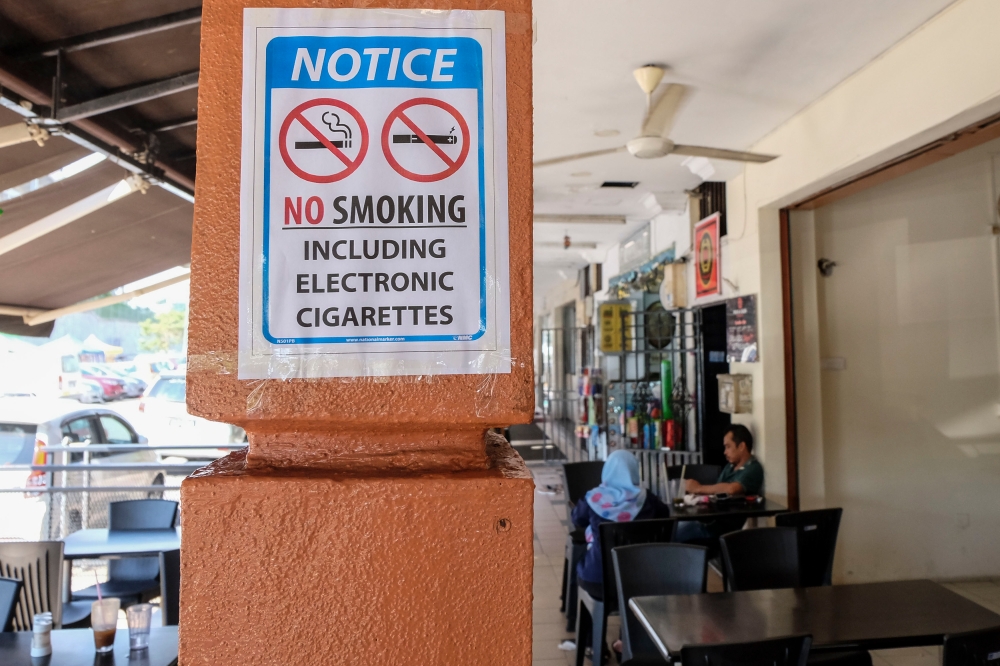 A no-smoking sign displayed at a restaurant in Shah Alam, Selangor also clearly depicts the prohibition against the use of electronic cigarettes or vaping. — Picture by Yusof Mat Isa
