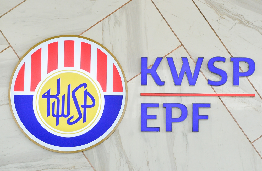 The report states that the proposed EPF contribution rate for non-citizen employees with a new contract of employment is 11 per cent for employees and 12-13 per cent for employers, depending on salary compensation. — Picture by Miera Zulyana