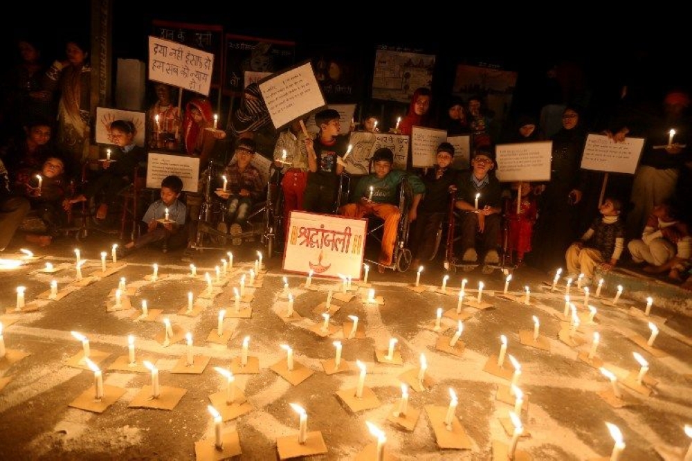 Children born with congenital disease, second generation victims of the 1984 gas disaster, participate in a candlelight vigil disaster in Bhopal, India on December 2, 2013. — AFP file pic