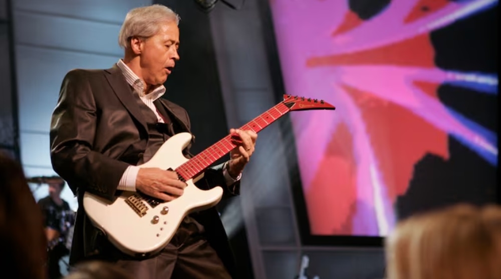 Wayne Osmond plays guitar during an Osmonds 50th anniversary show at the Orleans hotel-casino in Las Vegas in 2007. — Reuters pic  