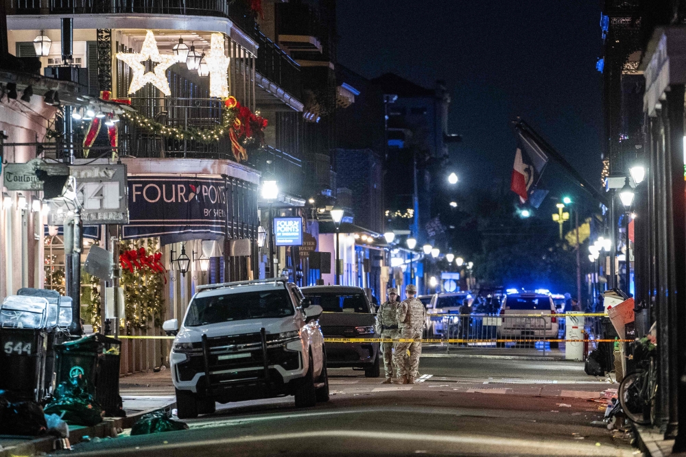 Members of the National Guard monitor a blocked off section of the French Quarter, after at least 15 people were killed during an attack early in the morning on January 1, 2025 in New Orleans, Louisiana. — AFP pic