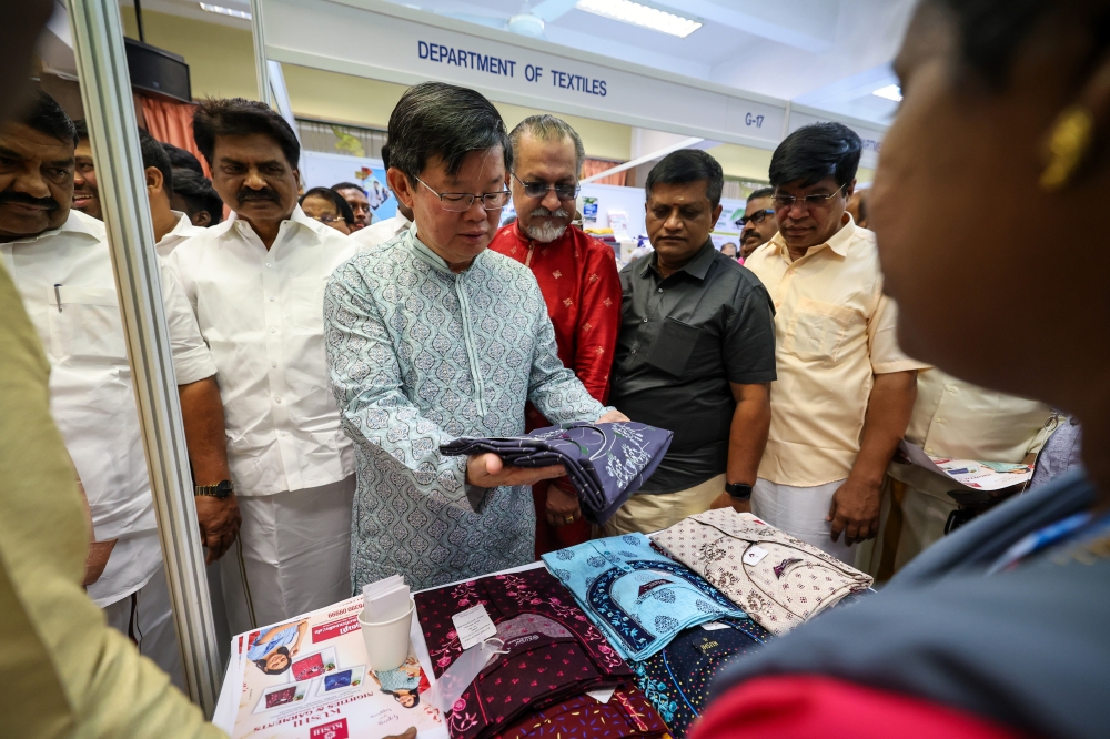 Penang Chief Minister Chow Kon Yeow (third from left) visits the exhibition booths during the 11th Global Organisation of Tamil Origin Meet at Dewan Sri Pinang in George Town on January 4, 2025. — Bernama pic