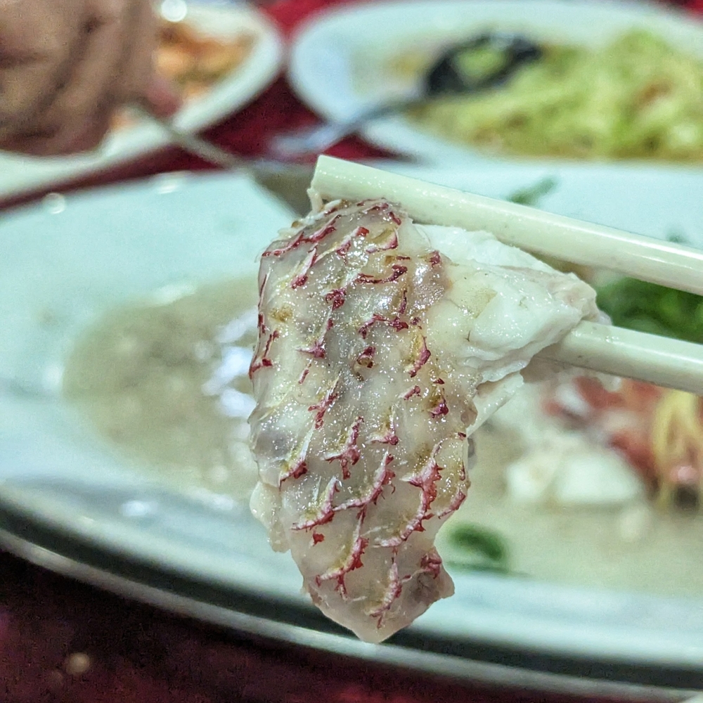 The firm, but tender flesh of the snapper after steaming. — Picture by Ethan Lau