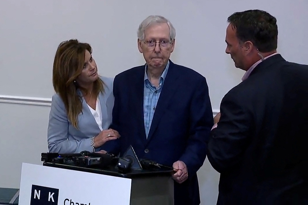 Top US Senate Republican Mitch McConnell froze up for more than 30 seconds on August 30, 2024 during a public appearance before he was escorted away. — Reuters pic