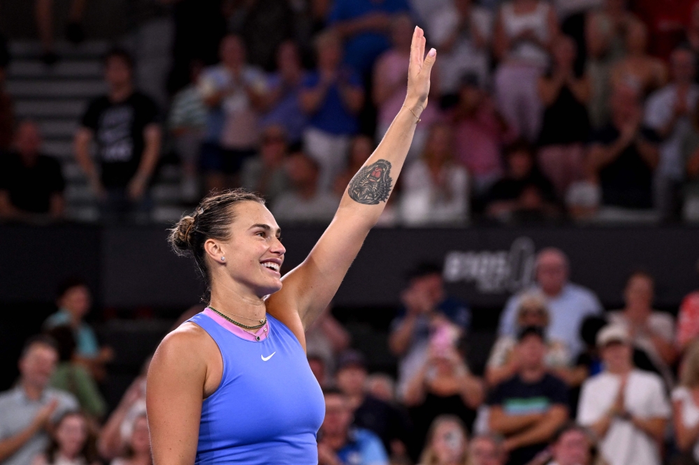 Belarus' Aryna Sabalenka celebrates defeating Russia's Polina Kudermetova in their women's singles final match at the Brisbane International tennis tournament on Pat Rafter Arena in Brisbane January 5, 2025. — AFP pic