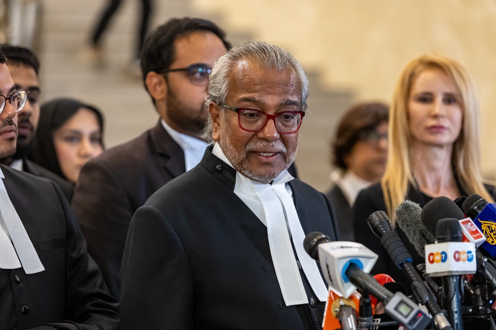 Lawyer Tan Sri Muhammad Shafee Abdullah speaks during a press conference at the Federal Court in Putrajaya on January 6, 2025. — Picture by Firdaus Latif