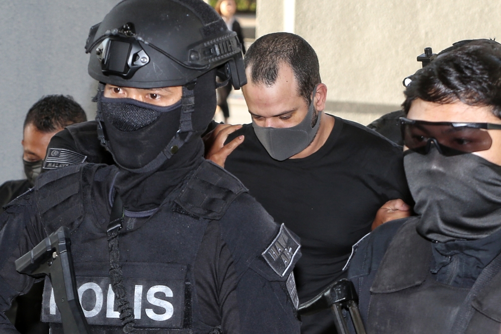 The trial of an Israeli man, Avitan Shalom, who is charged with two counts of possessing 200 bullets and trafficking six firearms at the Sessions Court here today was adjourned to tomorrow due to the unavailability of a Hebrew interpreter. — Picture by Choo Choy May .