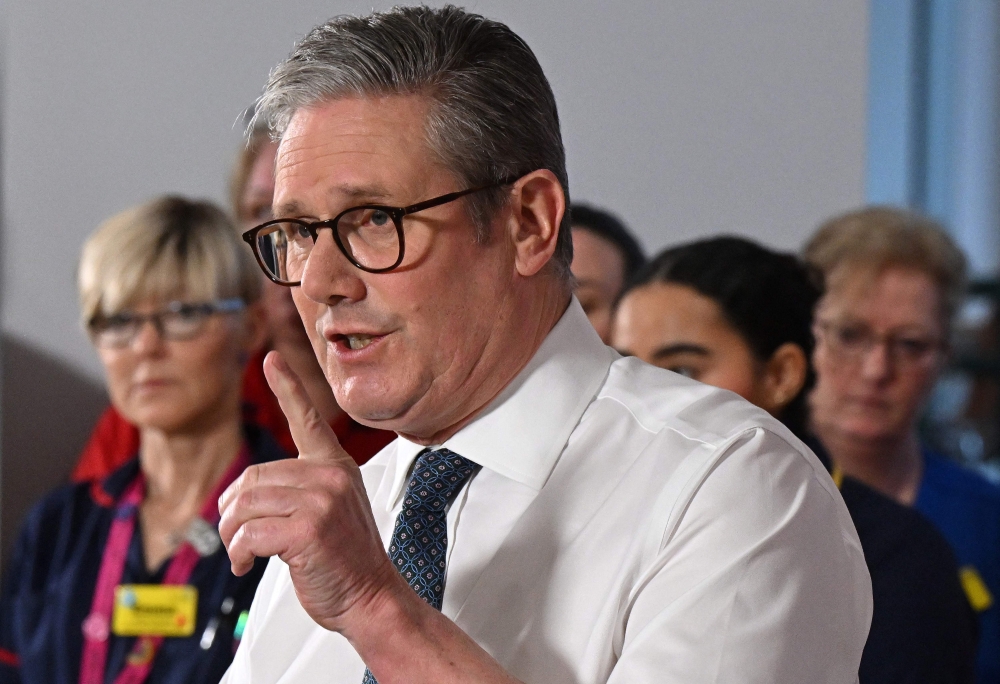 British Prime Minister Keir Starmer today defended his record and slammed those spreading lies following days of hostile attacks from Elon Musk over historical child rape crimes in northern England. — AFP pic