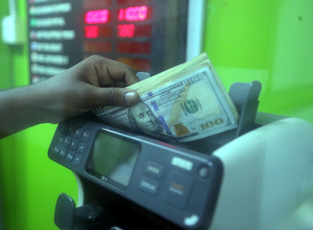 At 8am, the ringgit traded at 4.5080/5145 against the greenback, compared with Monday’s close of 4.5090/5135. — Picture by Farhan Najib