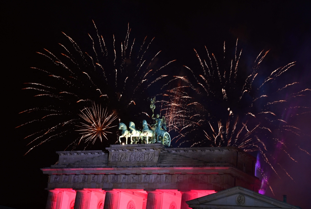Fireworks illuminate the Quadriga atop the Brandenburg Gate during the New Year celebrations in Berlin on January 1, 2025. — AFP pic