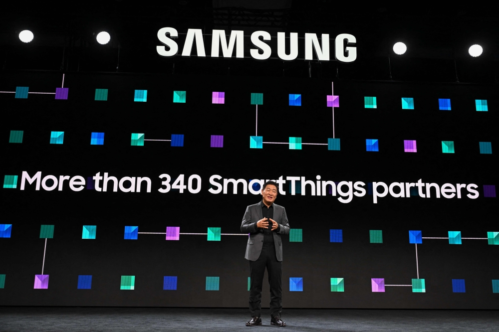JH Han, CEO and head of device experience at Samsung Electronics, speaks during the Samsung press  conference ahead of the Consumer Electronics Show (CES) in Las Vegas, Nevada on January 6, 2025. — AFP pic