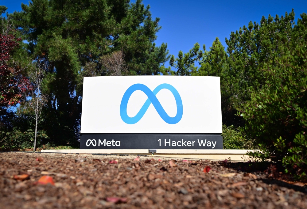 The Meta logo marks the entrance of Facebook corporate headquarters in Menlo Park, California on November 09, 2022. — AFP pic