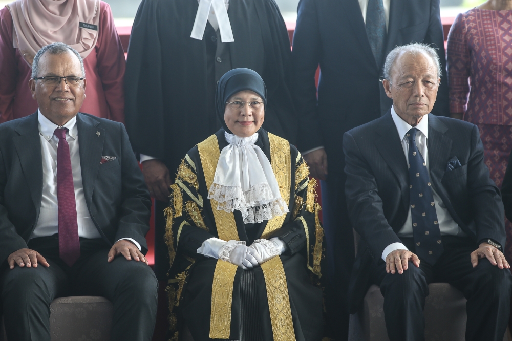 Chief Justice Tun Tengku Maimun Tuan Mat (centre) poses for a group pictures during the opening ceremony of the 2025 Legislative Year at the Putrajaya International Convention Centre (PICC) January 8, 2025. — Picture by Yusof Mat Isa