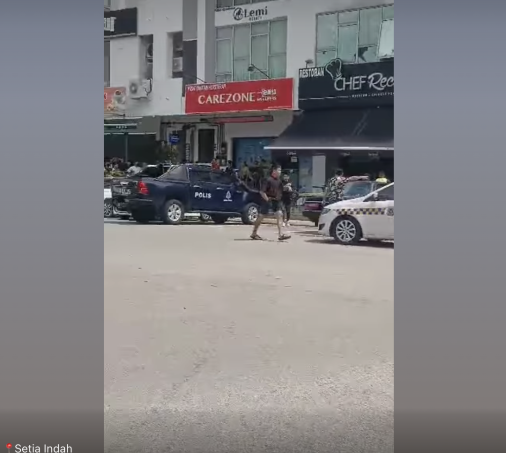 Screencap from a Facebook Reel shows the aftermath of a fatal shooting at a restaurant on Jalan Setia 3/2, Taman Setia Indah in Johor Baru on January 8, 2025. 