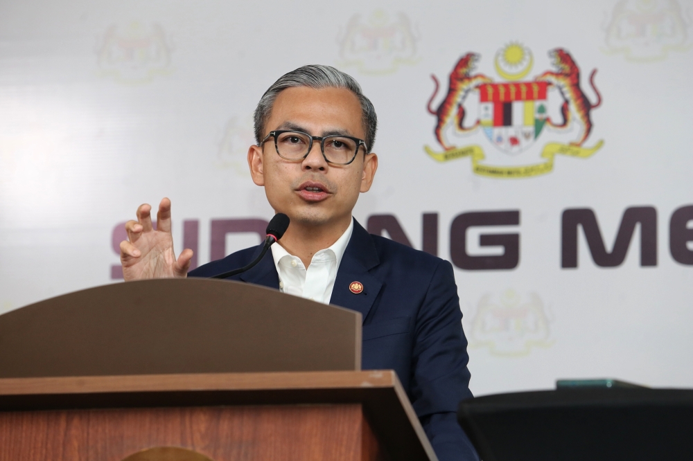 Communications Minister Fahmi Fadzil speaks during a press conference at the Communications Ministry, Putrajaya January 8, 2025. —  Picture by Choo Choy May